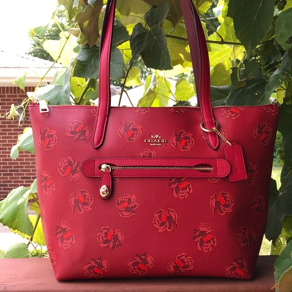 Coach Handbags - LIKE NEW COACH FLORAL PRINT TAYLOR TOTE